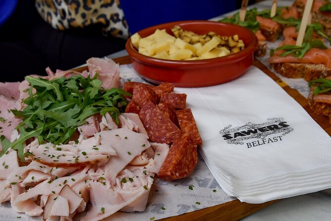Belfast Centre Food Tour of 12+ Local Irish Dishes & Drinks - Queen’s Arcade and the first tastes