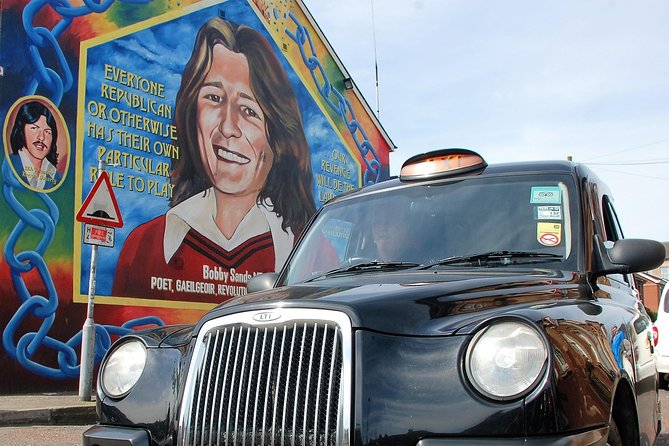 Belfast Famous Black Taxi Tour Political Murals & Peace Wall 2 Hr - Divis and the International Wall: starting with the conflict on the walls