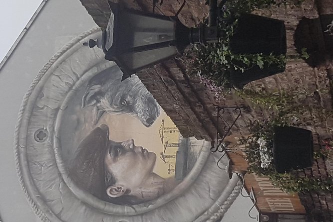 Belfast Music and Street Art Small Group Guided Experience - Kelly’s Cellars and the pub stories between stops