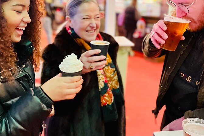 Christmas Lights and Markets Guided Walking Tour with Mulled Wine - From markets and performers to lesser-seen corners