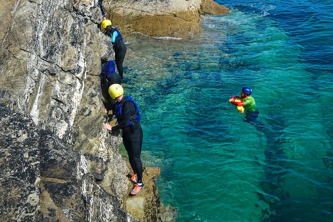 Coasteering Experience in Newquay - Entering the cave and learning to traverse