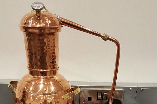 Distill a bottle of Gin on mini copper stills - A cocktail while your gin is distilling