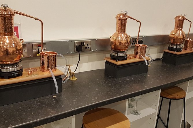 Distill a bottle of Gin on mini copper stills - Three samples help you find your style