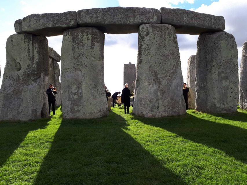 From London: Private Stonehenge Sunrise Viewing & Bath - The coach, guides, and group size