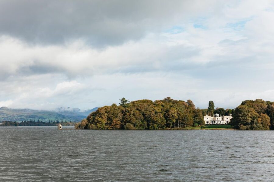 From Manchester: Lake District Bus Tour & Windermere Cruise - Hawkshead and its old village lanes