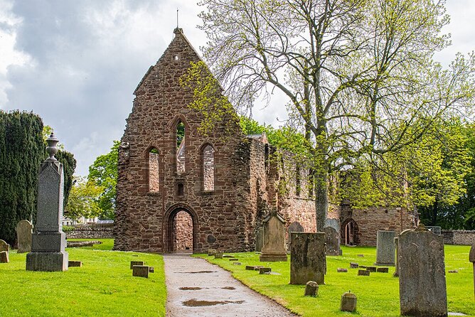 Full-Day Private Tour to Urquhart Castle Loch Ness and Inverness - Beauly and a priory viewed from the gate