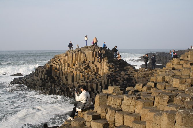 Giant's Causeway Day Tour and Belfast City Tour 1 Day Pass - Cushendun Caves: scenic, rocky, and not easy for everyone