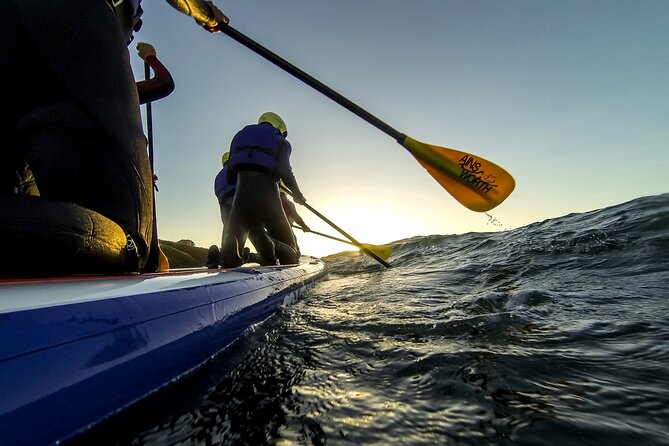 Giant Stand Up Paddle Boarding Experience in Newquay - Getting aboard the super SUP