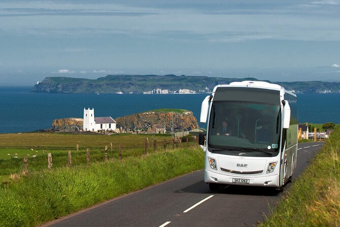 Giants Causeway & Castles Tour from Belfast: Guided tour - Carrickfergus Castle starts the day with serious stone walls