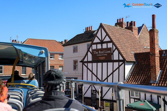 Golden Tours York Hop-on Hop-off Open Top Bus Tour with Audio Guide - Why the open top is both the attraction and the risk