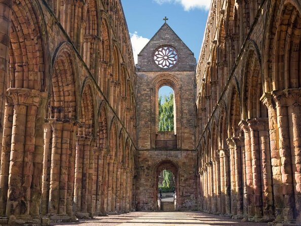 Hadrian's Wall & The Borders Tour from Edinburgh Incl. Admission - Walking the wall at Steel Rigg