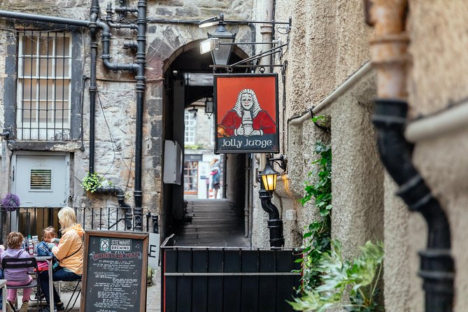 Highlights & Hidden Gems With Locals: Best of Edinburgh Private Tour - Closes, cemeteries, and streets most people miss