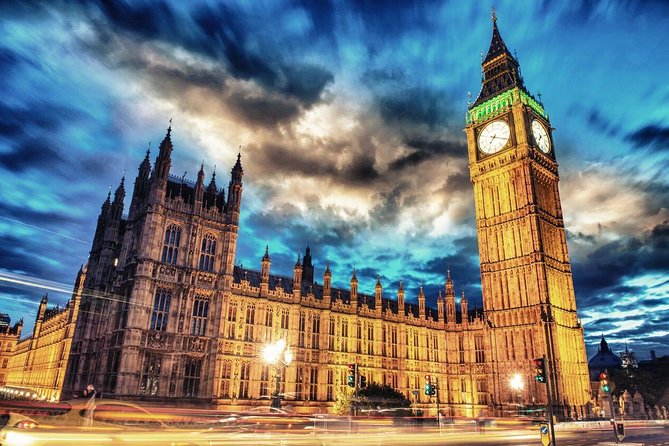 London by Night Sightseeing Open Top Bus Tour with Live Guide - The open-top view, with a weather warning