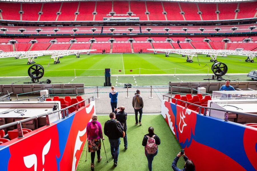 London: Wembley Stadium Guided Tour - Walking through the dressing rooms and players’ tunnel