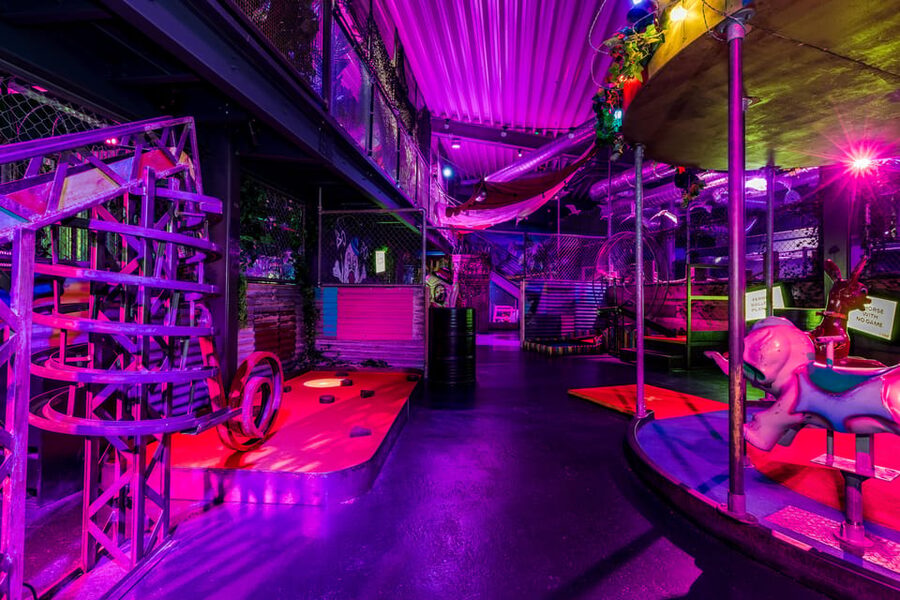 Manchester: Junkyard Golf Club Tickets for 9 or 18 Holes - The bar setup changes the pace