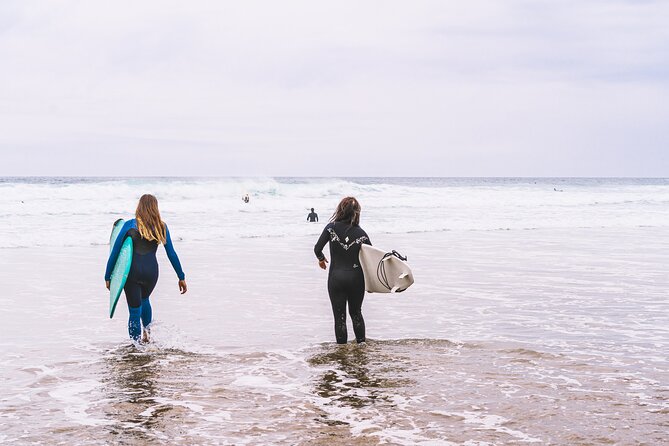 Private Surfing Lesson - Boards and wetsuits for different abilities